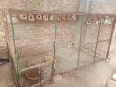 IRON CAGE WITH 16 HANDI FOR SALE