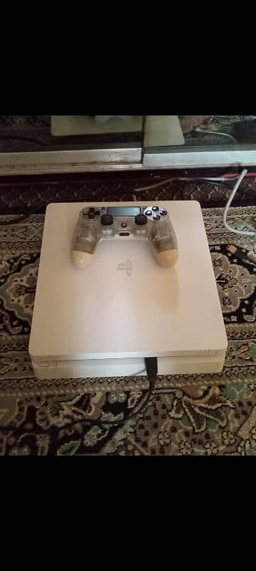 iam selling my PS4 slim 1TB jailbreak 2 controllers 11 games installed 0