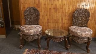 pair of chinioti chairs along with table