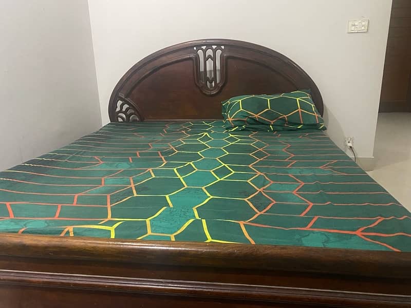 Old used wooden bed with mattress 3