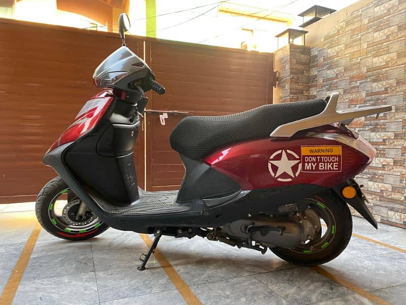 United Scooty 100cc variant 0