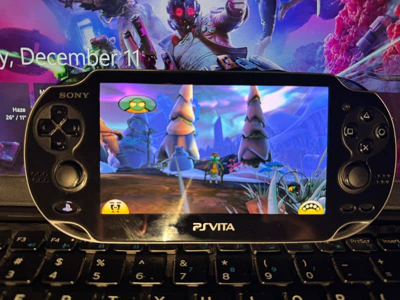 PS Vita OLED model 1000 mint condition with games 2