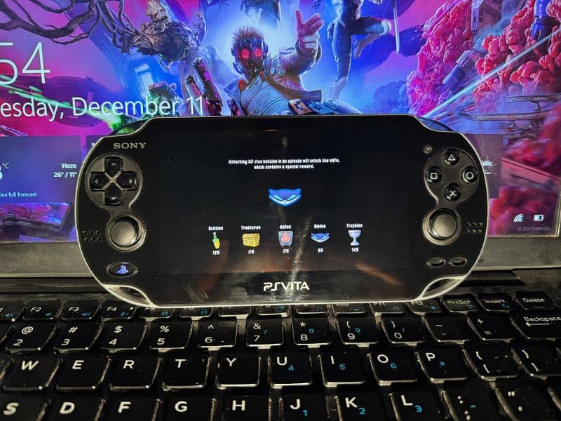 PS Vita OLED model 1000 mint condition with games 4