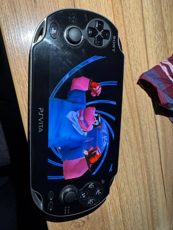 PS Vita OLED model 1000 mint condition with games 7