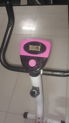 Pink cardio Exercise cycle Has a cardio meter