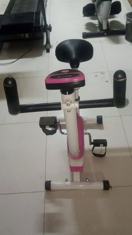 Pink cardio Exercise cycle Has a cardio meter 1