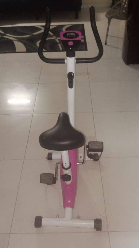 Pink cardio Exercise cycle Has a cardio meter 2