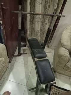 gym seat with rods and heavy weight