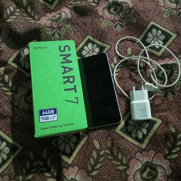 Infinix smart 7 with box charger in warranty 3