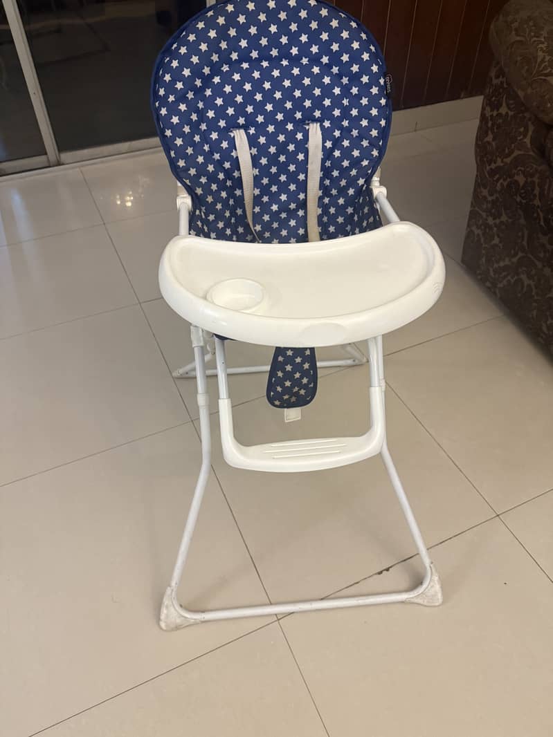 Royal blue tinnies high chair 10/10 condition few months used only 7