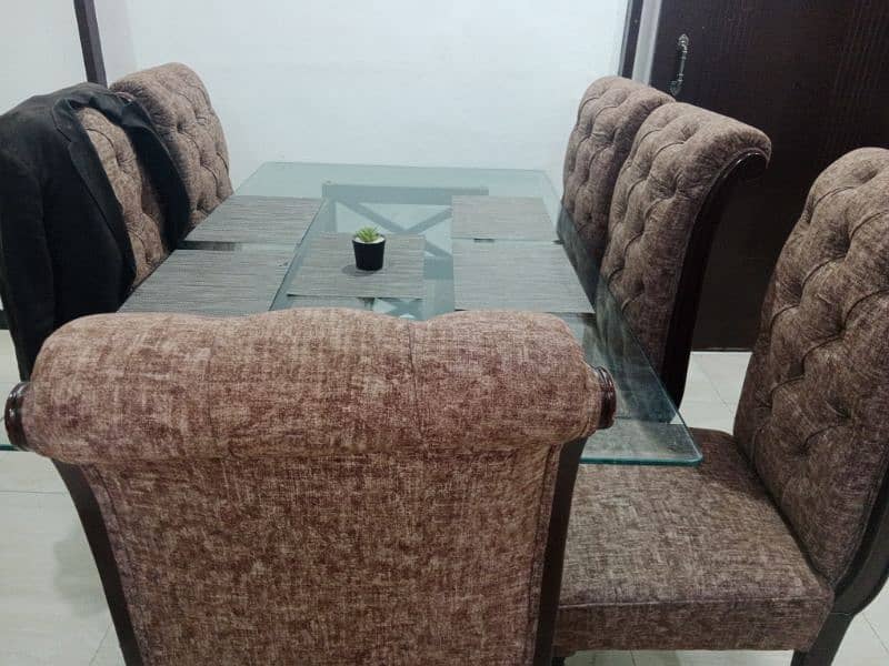 we are selling dining table and 6 chair 5