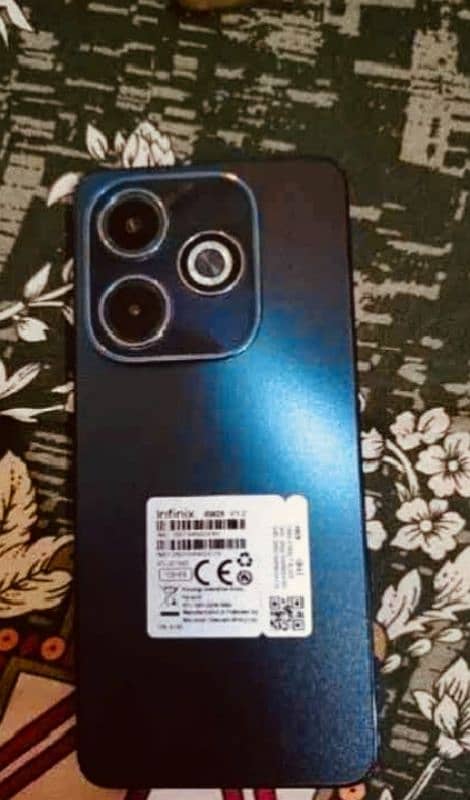 Infinix hot 40i 8. . . 128 0