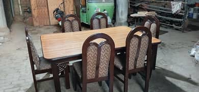 wooden dining table with 6 chairs