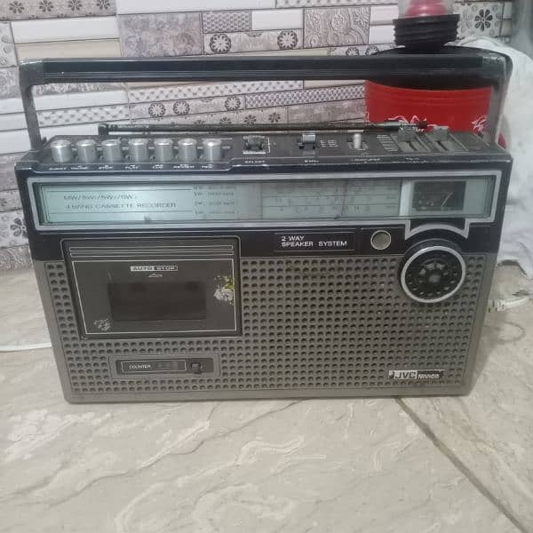 antique radio and vintage tape recorder 0