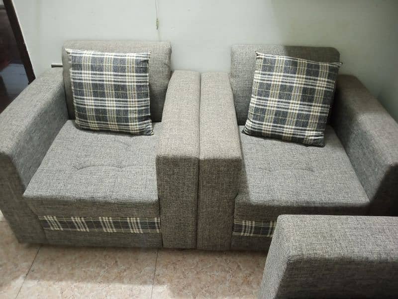 7 Seater sofa set almost new condition with 7 cousions 2