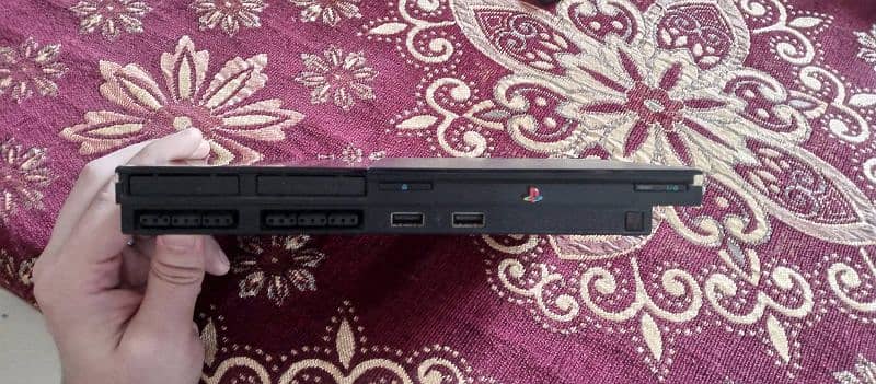 PlayStation 2 mini slim wali hai 1