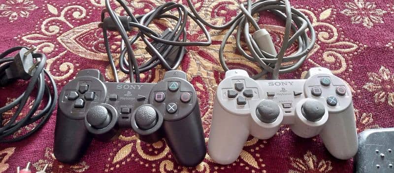 PlayStation 2 mini slim wali hai 6