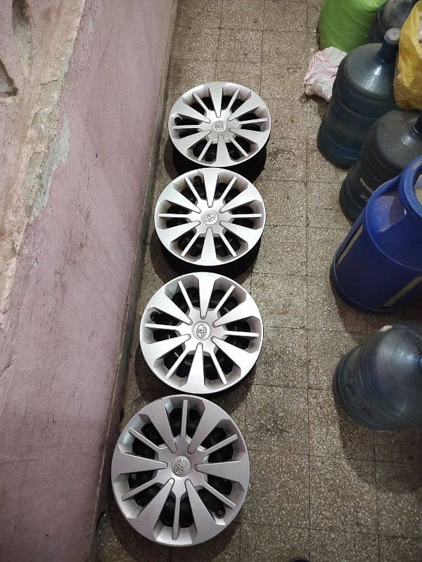 Toyota Passo 14 Inch Genuine Japanese Rims and Wheel Caps 0