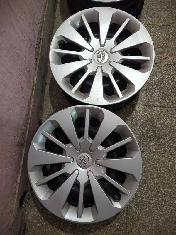 Toyota Passo 14 Inch Genuine Japanese Rims and Wheel Caps 1