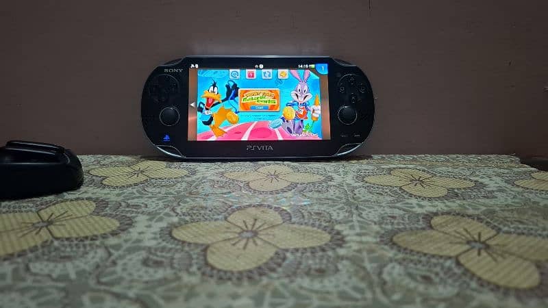 PS Vita OLED model 1000 mint condition with games 9