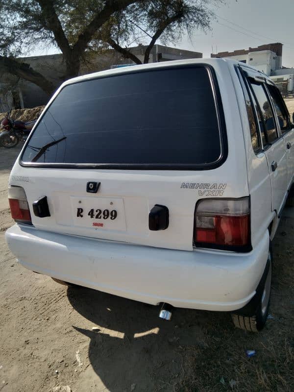 Mehran white color car 4