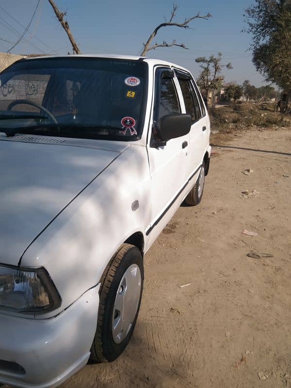 Mehran white color car 7