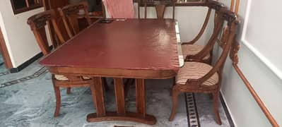 wood dining table. . . .