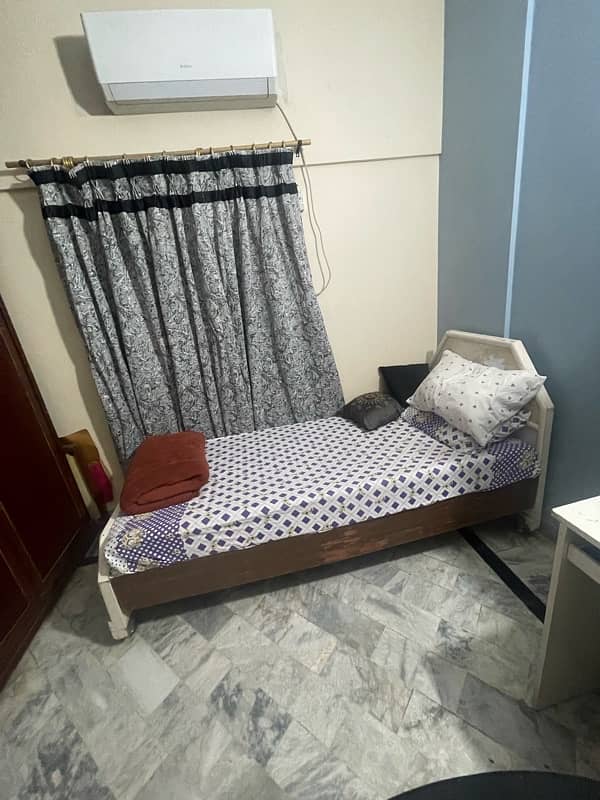 single wooden bed set with side table , wall fitted al mirah 0