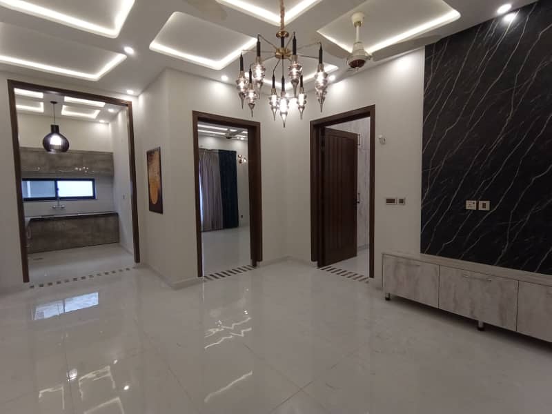 FOR RENT VERY REASONABLE PRICE 10 MARLA BRAND NEW UPPER PORTION OR LOWER PORTION LOCK SECTOR E BAHRIA TOWN LAHORE 11