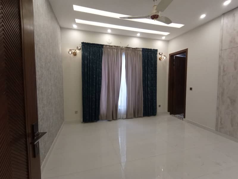 FOR RENT VERY REASONABLE PRICE 10 MARLA BRAND NEW UPPER PORTION OR LOWER PORTION LOCK SECTOR E BAHRIA TOWN LAHORE 19