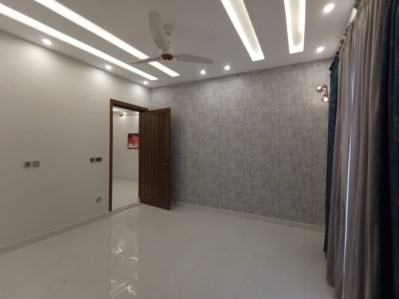 FOR RENT VERY REASONABLE PRICE 10 MARLA BRAND NEW UPPER PORTION OR LOWER PORTION LOCK SECTOR E BAHRIA TOWN LAHORE 24