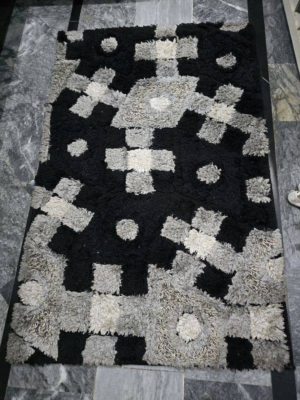 black ,white and grey rug 0