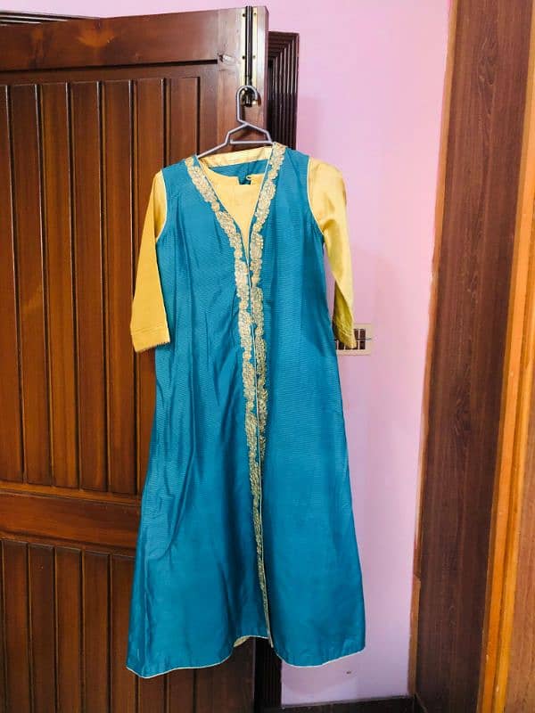 Two peice kurta and trouser with gown 0