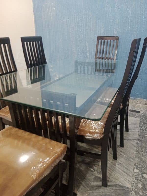 one  month used new condition teble with 6 chairs for sale 0