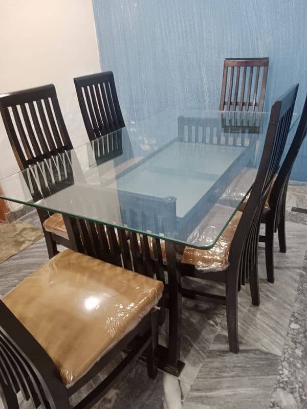 one  month used new condition teble with 6 chairs for sale 1