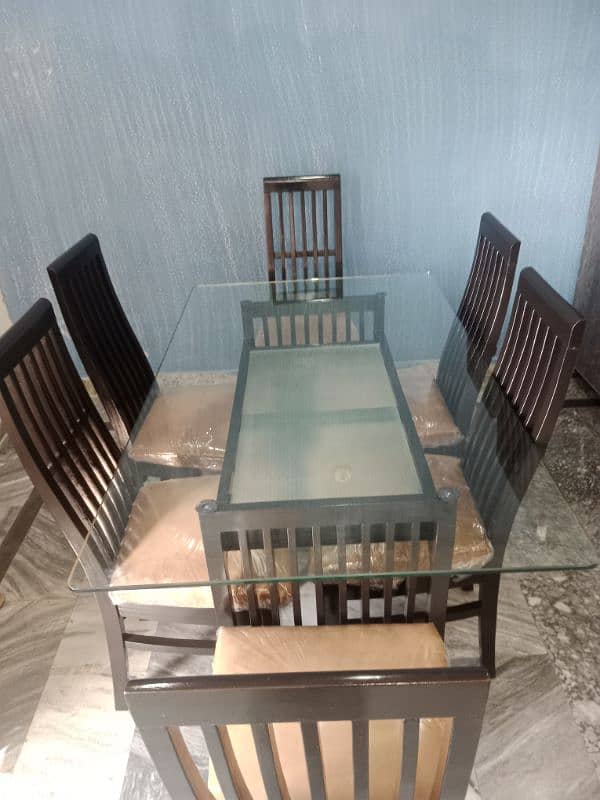 one  month used new condition teble with 6 chairs for sale 5