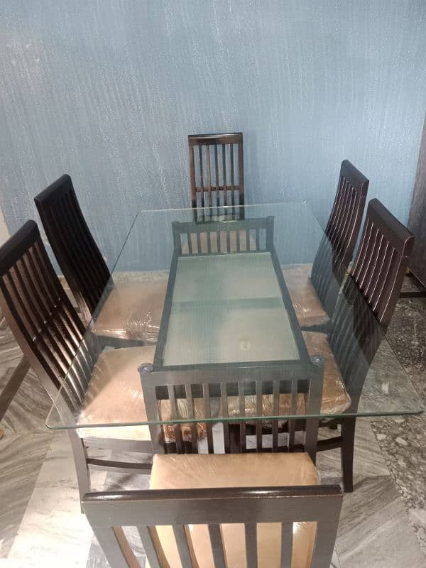 one  month used new condition teble with 6 chairs for sale 8