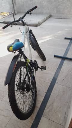 selling my bicycle color black plus blue. .