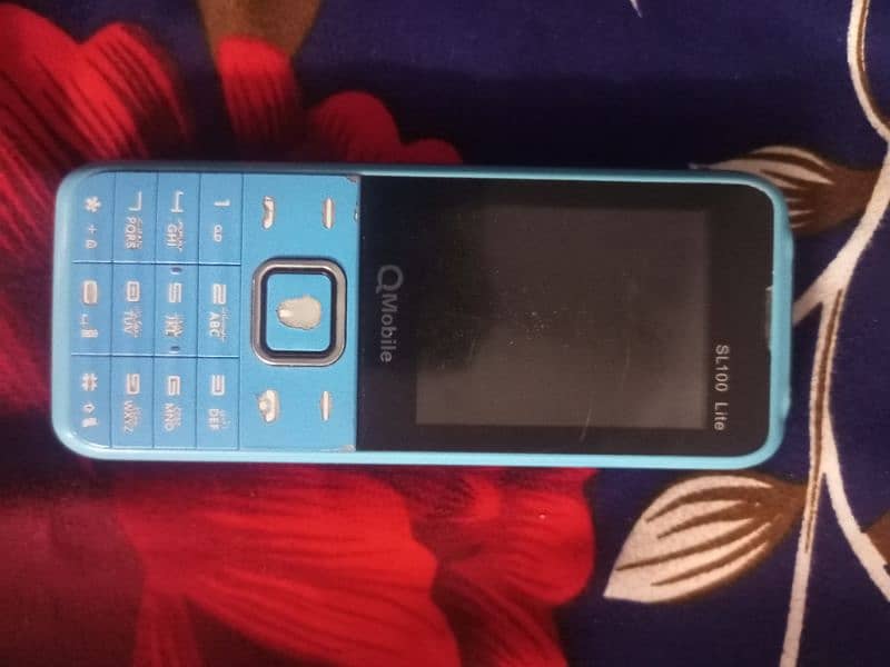 Q mobile Sl 100 0