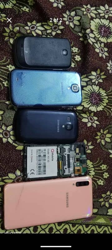 Samsung q mobile in ka 4 mobile ka parts ha 1