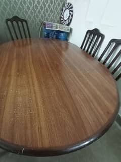 wooden dining table with 6 chairs