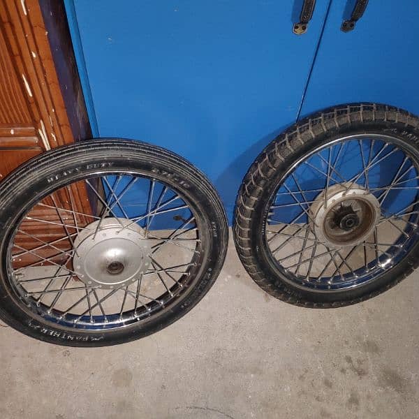 I am selling gs 150 tyres with rims 2