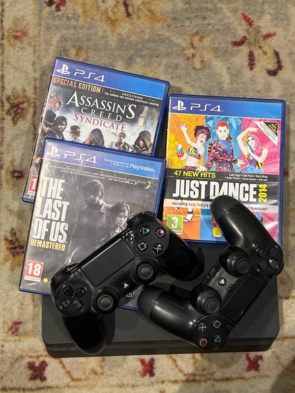 PS4 Slim 500GB with 2 Controllers & 3 Games 0