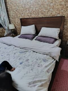 king size bed with two side tables