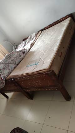 wooden Bed with spring mattress and site Boxes