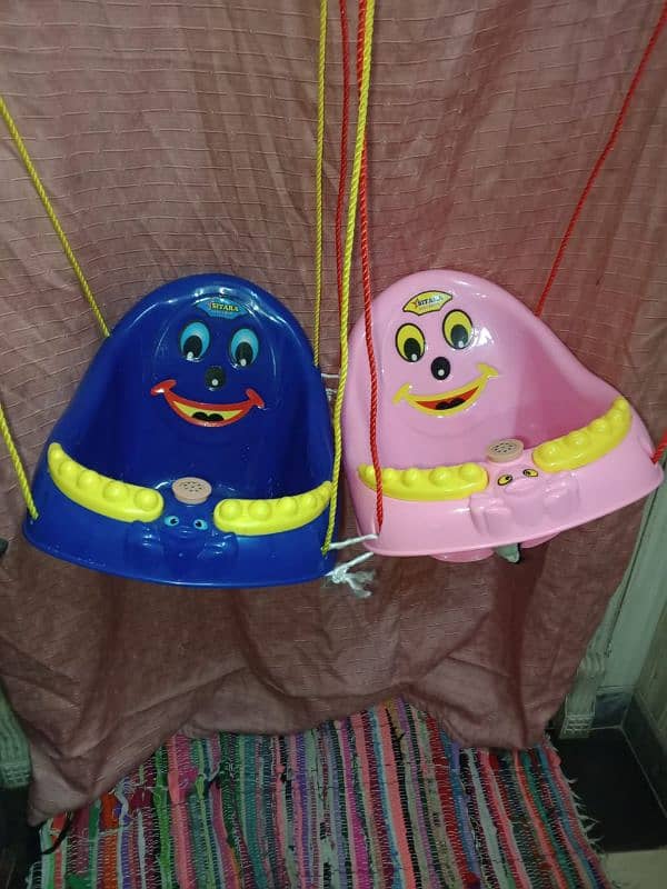 new baby swings available pink and blue close 1