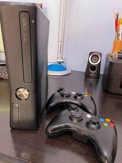 Xbox 360 with two wireless controllers