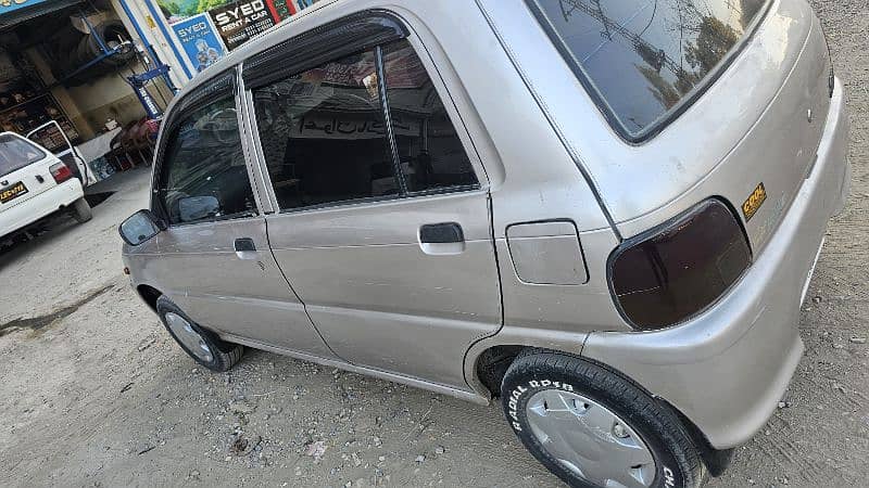 Daihatsu Cuore 2004 1