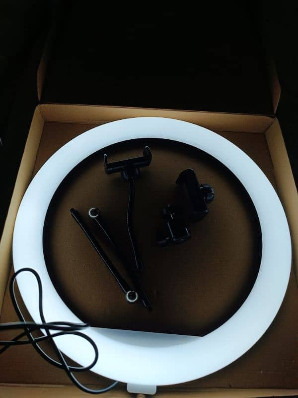 ring light with a tripod stand. (final price 2500 no bargain). 6