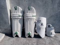 Cricketing Pads and Thigh Guards.